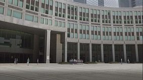 red data girl tokyo metropolitan government building courtyard